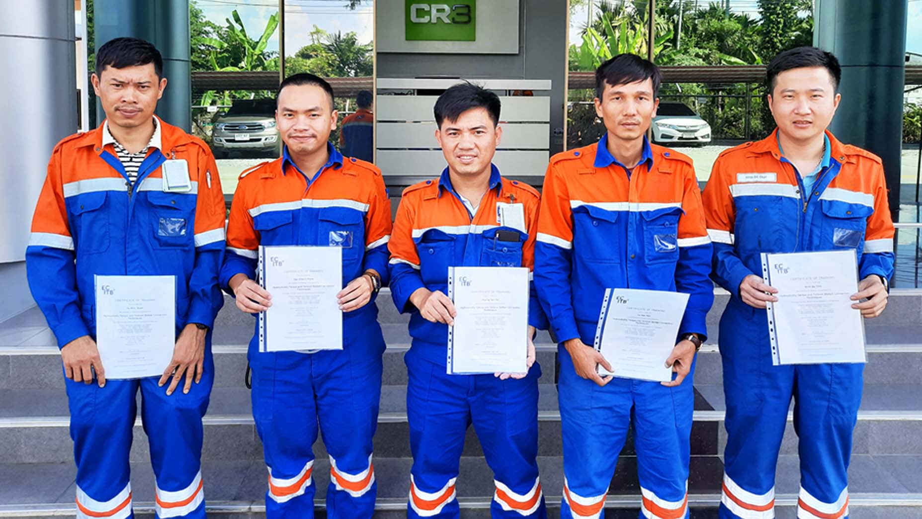 Group photo of trainees with their certificates