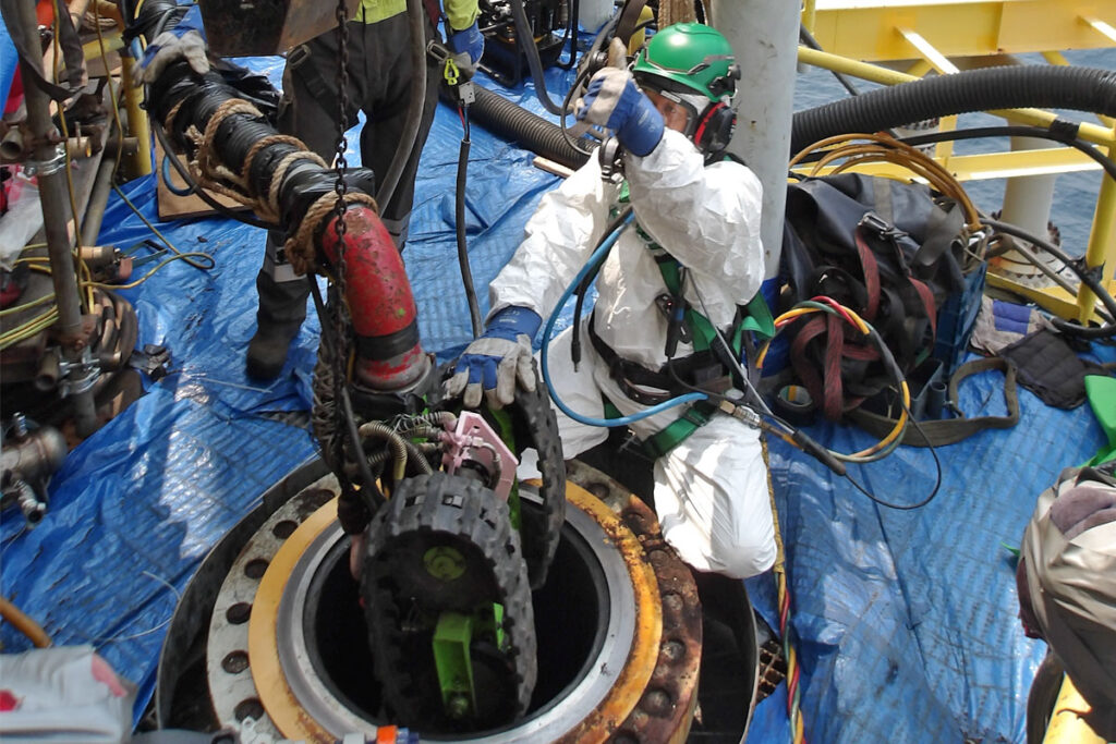 Zone-rated CR3 Rover entering a 20-inch manway for catalyst extraction